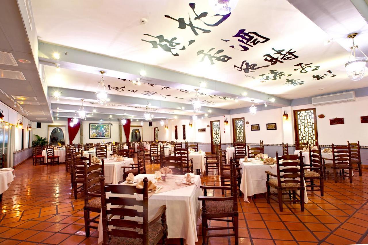 โพรมิสแลนด์ รีสอร์ท&ลากูน โซ่วเฟิง ภายนอก รูปภาพ Restaurant in the hotel
