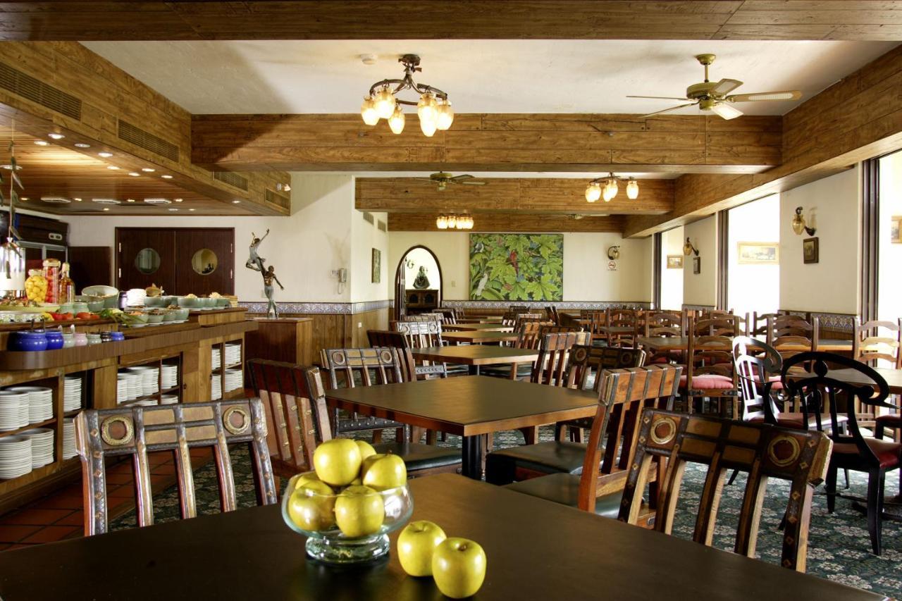 โพรมิสแลนด์ รีสอร์ท&ลากูน โซ่วเฟิง ภายนอก รูปภาพ The dining room at the hotel